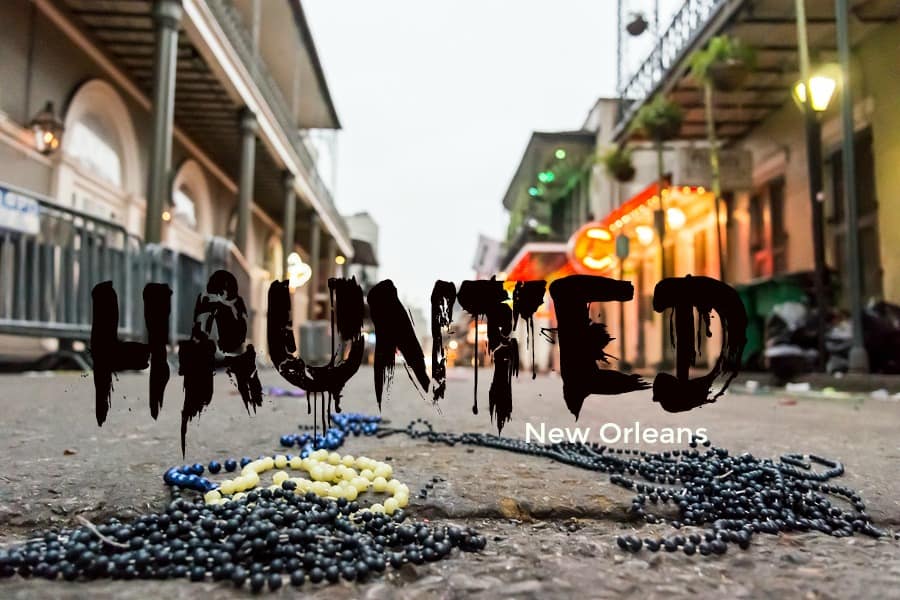 Discarded beads litter Bourbon Street in New Orleans early on a Sunday morning