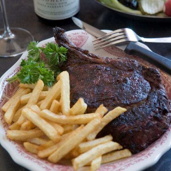 Hitching Post II in Santa Ynez Valley shares its recipe and wine pairing for its Oak-Grilled Steak with Mushrooms, Onions and Pinot Noir Sauce